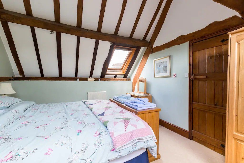 view of bed in bedroom in house