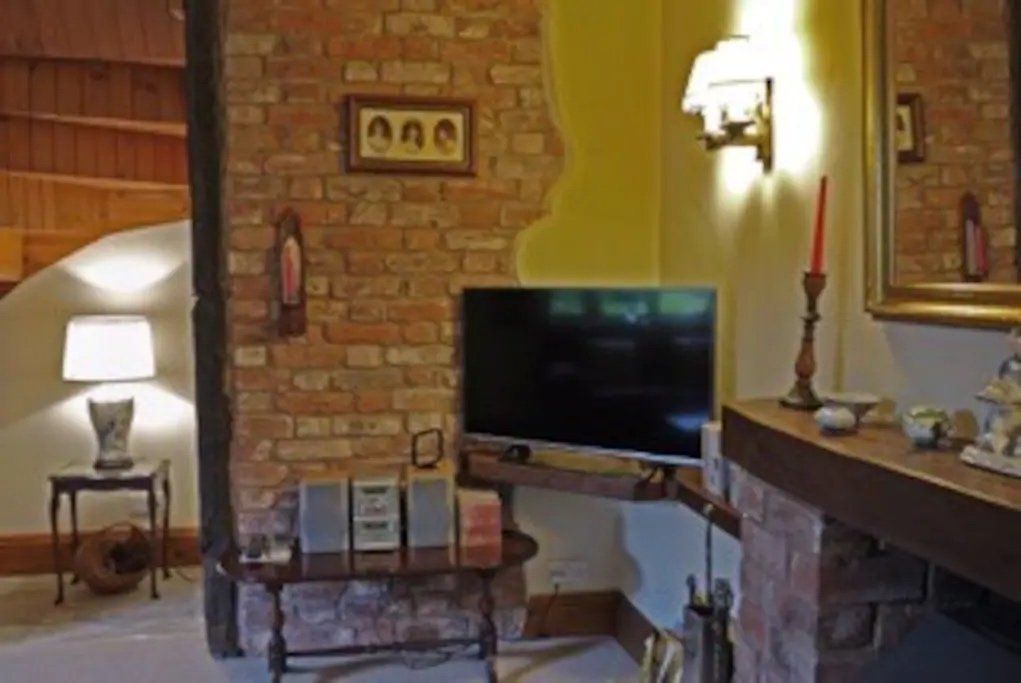 TV in lounge at accommodation