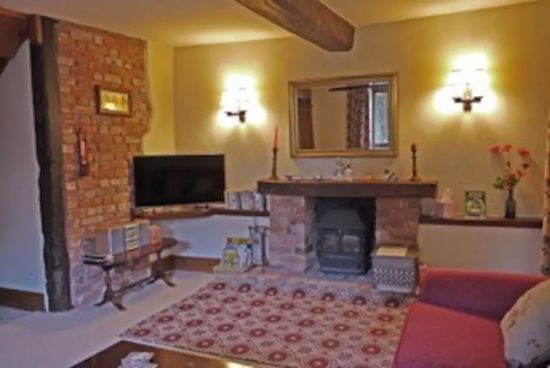 fireplace in the lounge area of accommodation