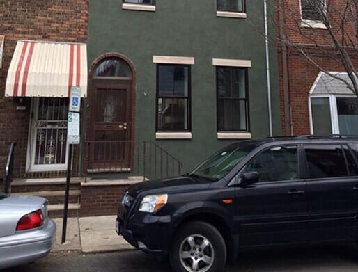 Man Plastering a Wall — Structural Damage in Philadelphia, PA Man Plastering a Wall — Structural Damage in Philadelphia, PA