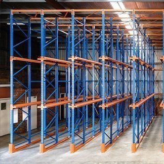 A warehouse filled with lots of shelves and racks.