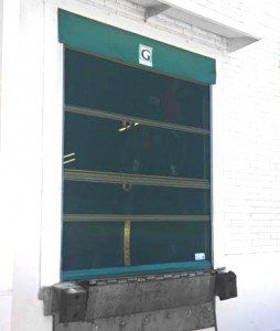A green door with the letter g on it