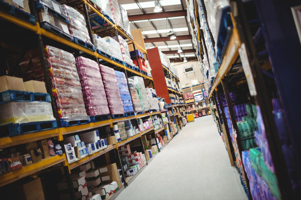 A warehouse filled with lots of shelves and boxes.