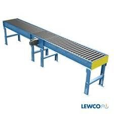 A conveyor belt with a motor attached to it on a white background.