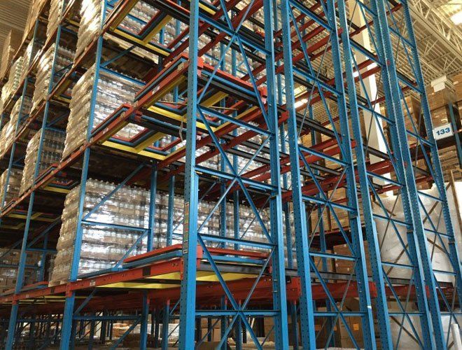 A warehouse filled with lots of shelves and boxes.