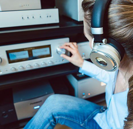 Woman Adjusting Knobs on Stereo | Ephrata, PA | Record Connection