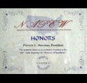 A close up of a certificate that says honors on it.