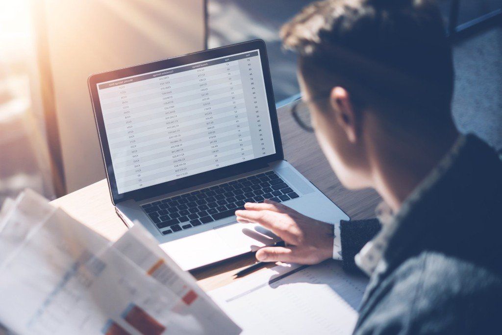 Accounting & Tax Consultants — Accountant with his Laptop in Sioux City, IA