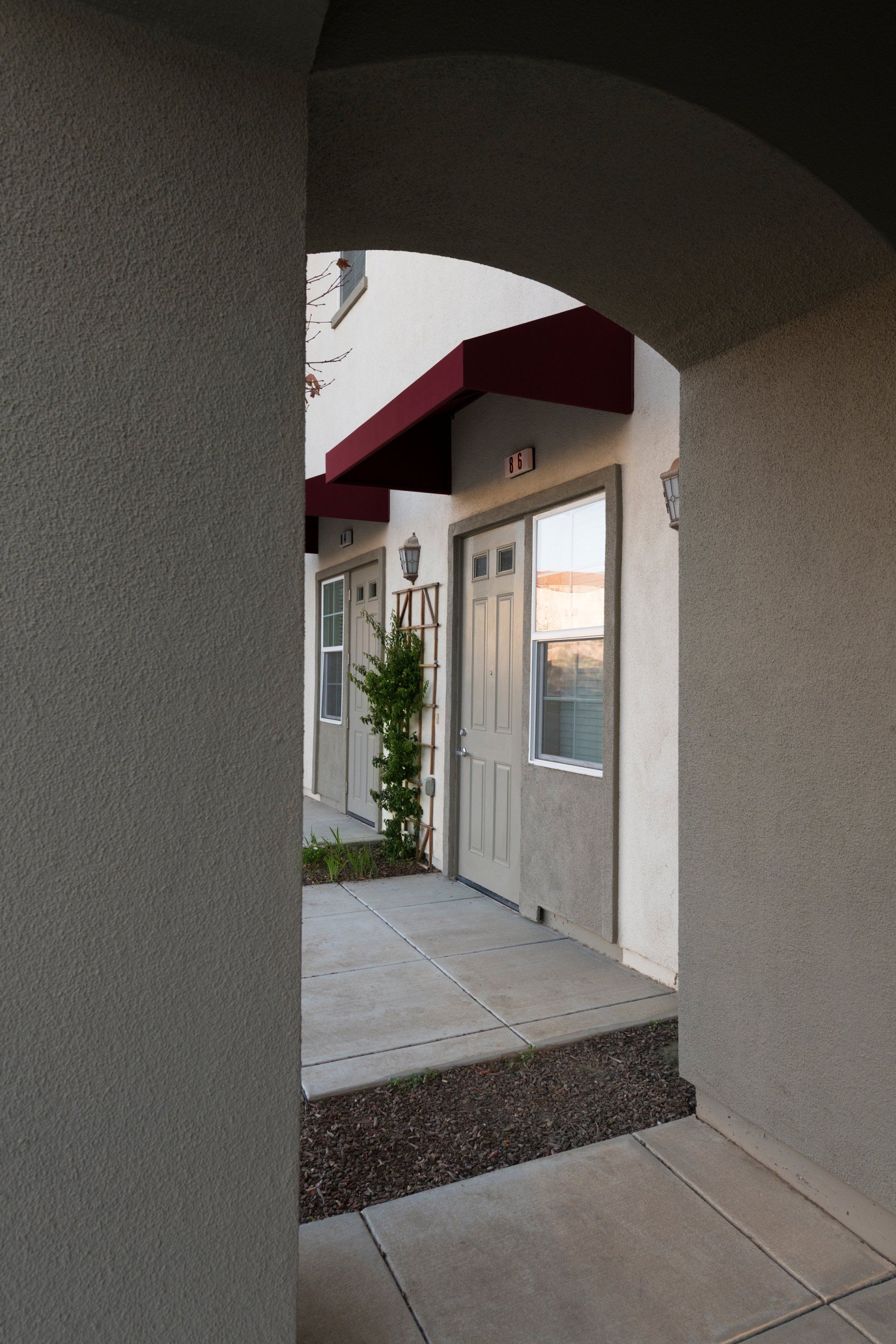 A building with a red awning over the door