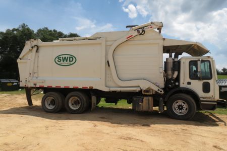 Container filled with waste from a construction site