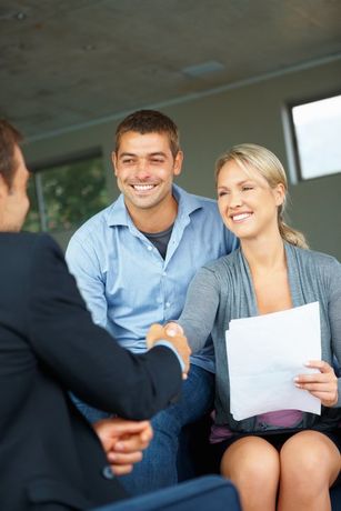 Couple greeting advisor — Saint Cloud, MN — Moe Agency Inc