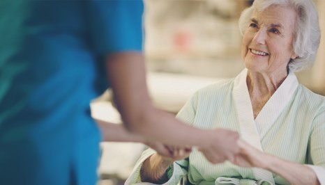 A smiling elderly woman