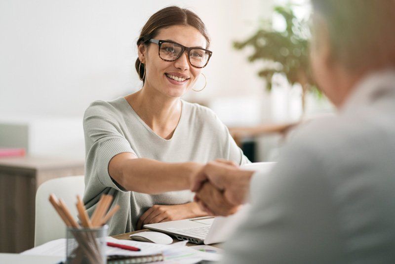 Woman Shaking Hands — Nashua, NH — Merrimack Valley Counseling Association Woman Shaking Hands — Nashua, NH — Merrimack Valley Counseling Association