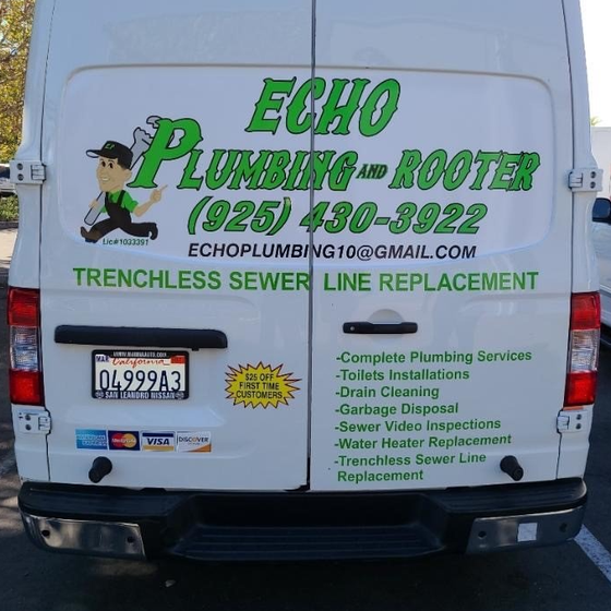 A white van that says echo plumbing and rooter on the back