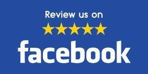 A blue sign that says `` review us on facebook ''