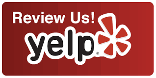A yelp logo that says review us on it
