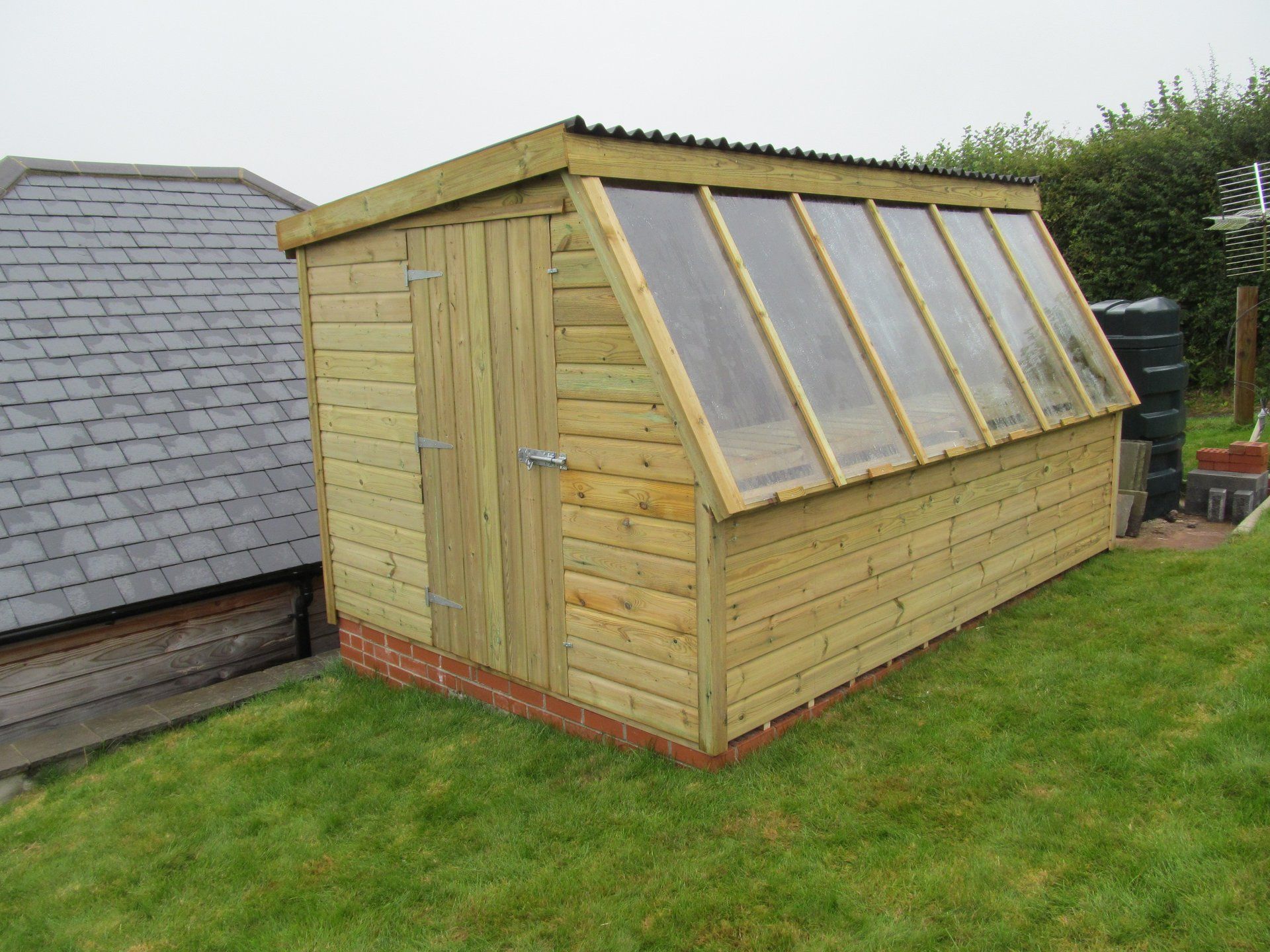 Solar Potting Shed with door to the end and sloping windows for light