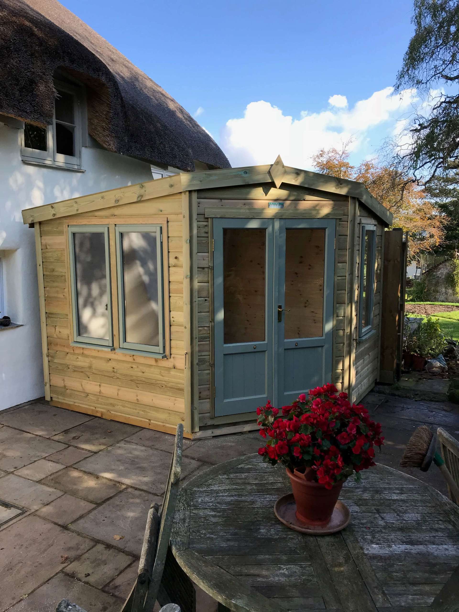 The Corner Summerhouse constructed to fit the corners of your garden