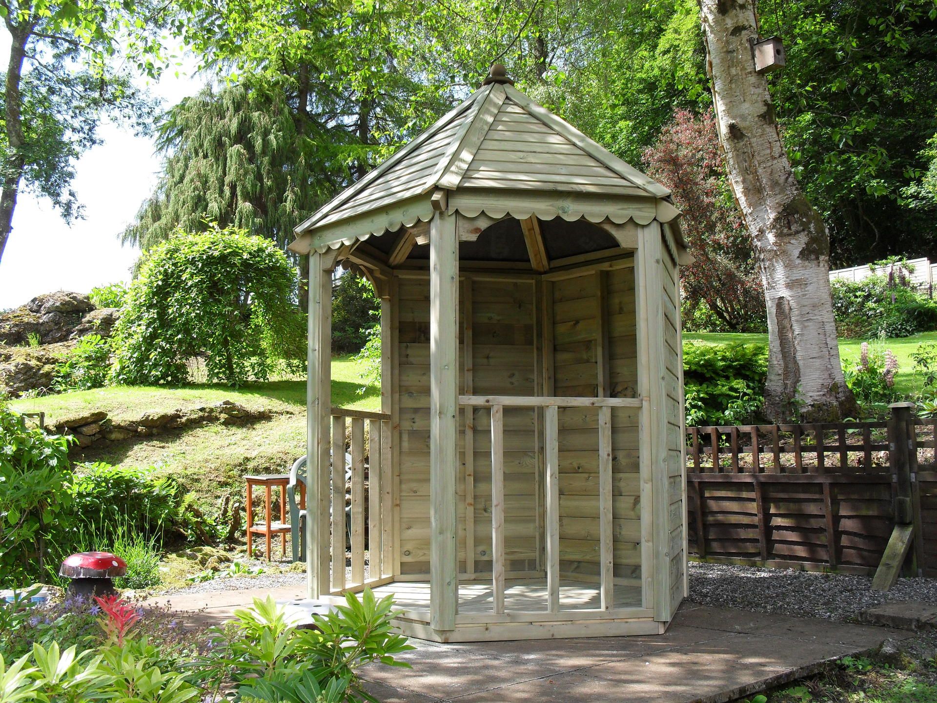 Bespoke garden gazebo building in a beautiful Devon garden