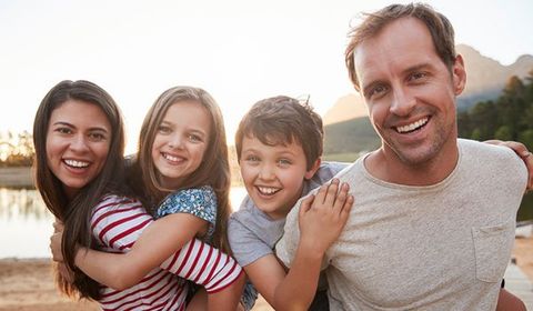 Orthodontics — Picture Of Family Smiling Together in Bala Cynwyd, PA