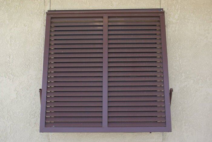 Durable Hurricane Shutter — Brown Closed Shutter  in Corpus Christi, TX