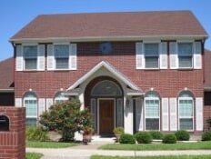 Window Shutter Repair — House With Full Window Shutter  in Corpus Christian, TX