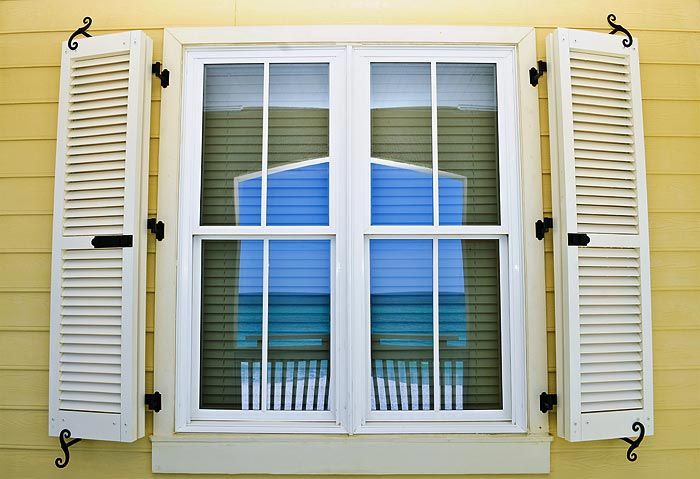 Great Hurricane Shutter — Window with White Colonial Shutter in Corpus Christian, TX