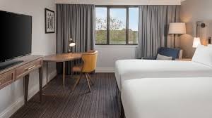 bedroom and slide table with light and gray curtain