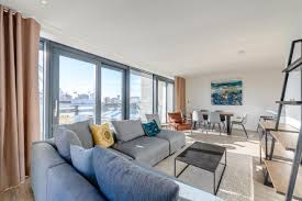 living room, gray sofa and cushion with mixed yellow and blue