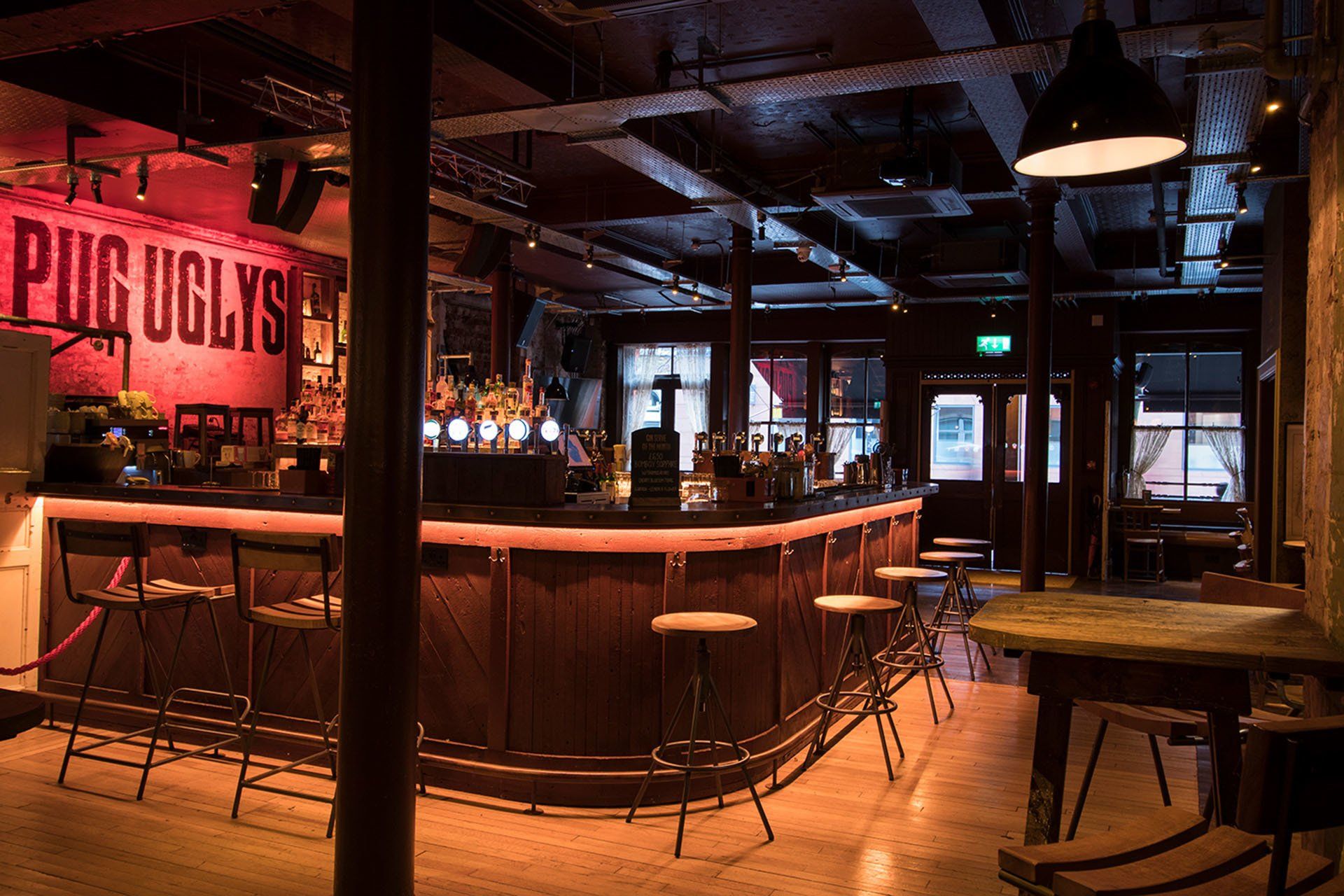 Pug Ugly’s bar with pink lighting