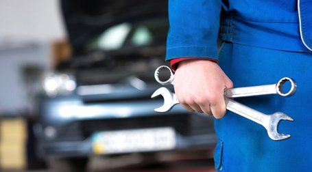Accessories man fixing engine