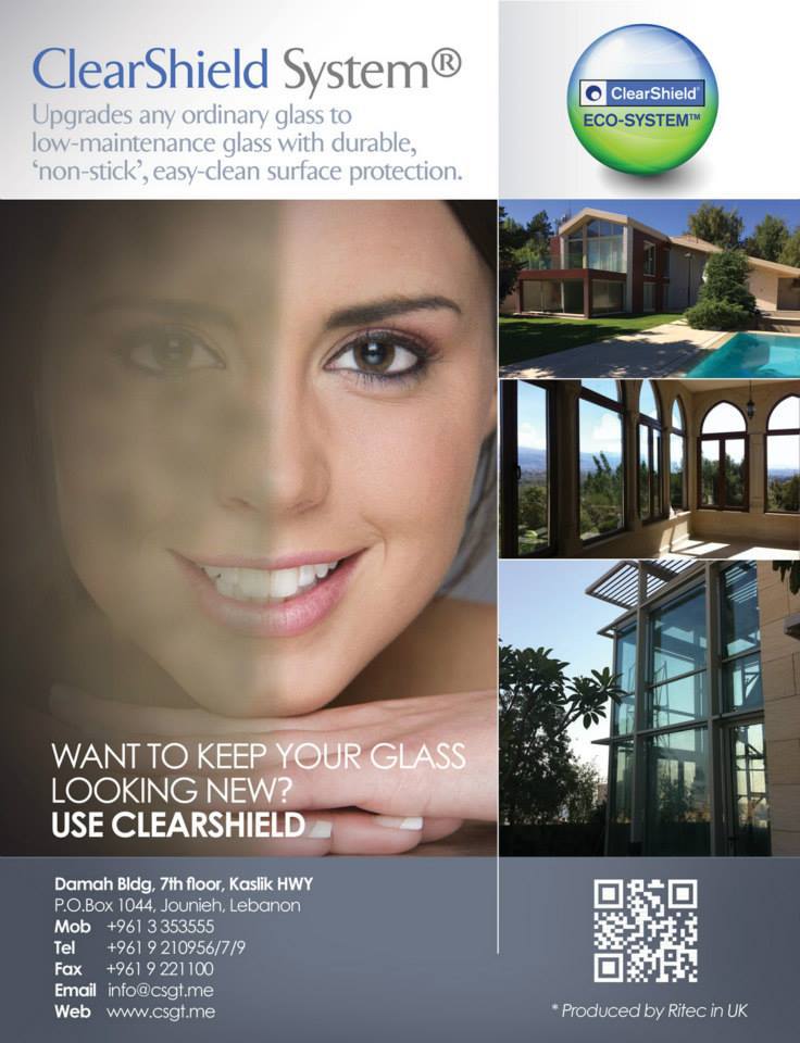 An advertisement for clearshield system shows a woman 's face and a house.