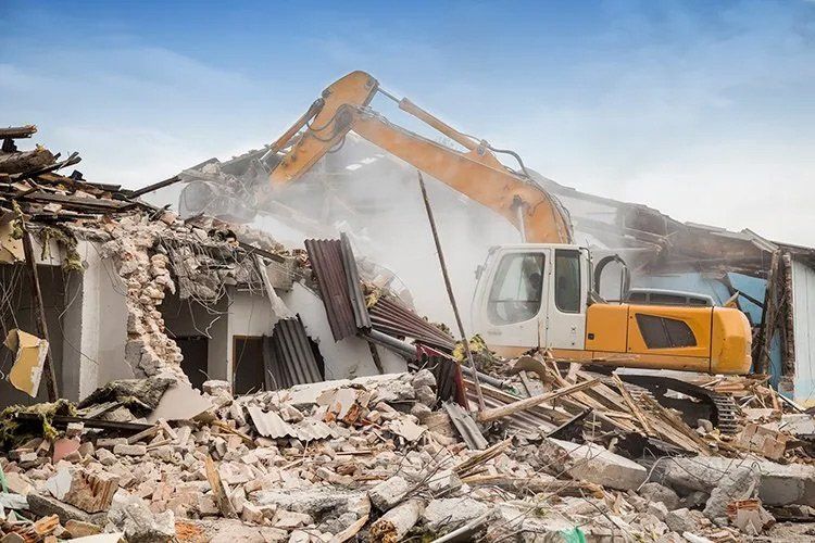 Excavator Demolishing Barracks — Indianapolis, IN — W R Beach, Inc.