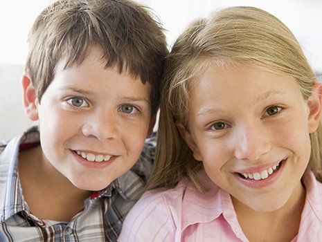 Brother and sister with smiles after emergency dental work in Mililani Brother and sister with smiles after emergency dental work in Mililani