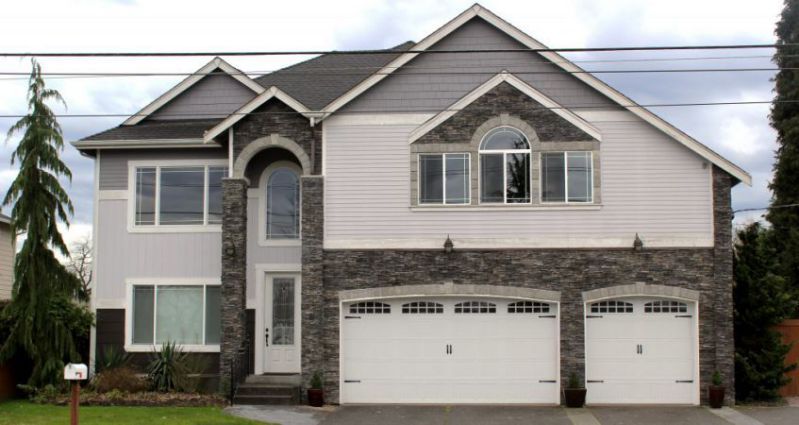 White Modern home front view - Garage doors in San Francisco, CA