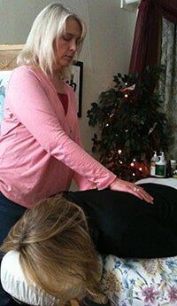 Woman Doing Karuna Reiki — Healing Studio in Bangor, ME Woman Doing Karuna Reiki — Healing Studio in Bangor, ME