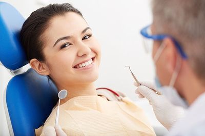 Smiling Patient at Dental Clinic — Spencer, WV — Gentle Dental Care Smiling Patient at Dental Clinic — Spencer, WV — Gentle Dental Care