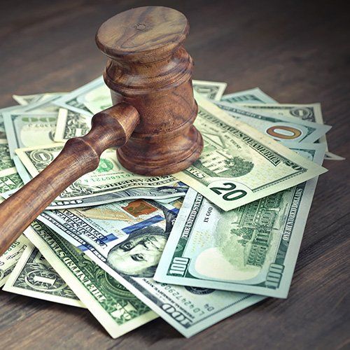 Dollars With Gavel— Filing Bankruptcy in Carlisle, PA Dollars With Gavel— Filing Bankruptcy in Carlisle, PA