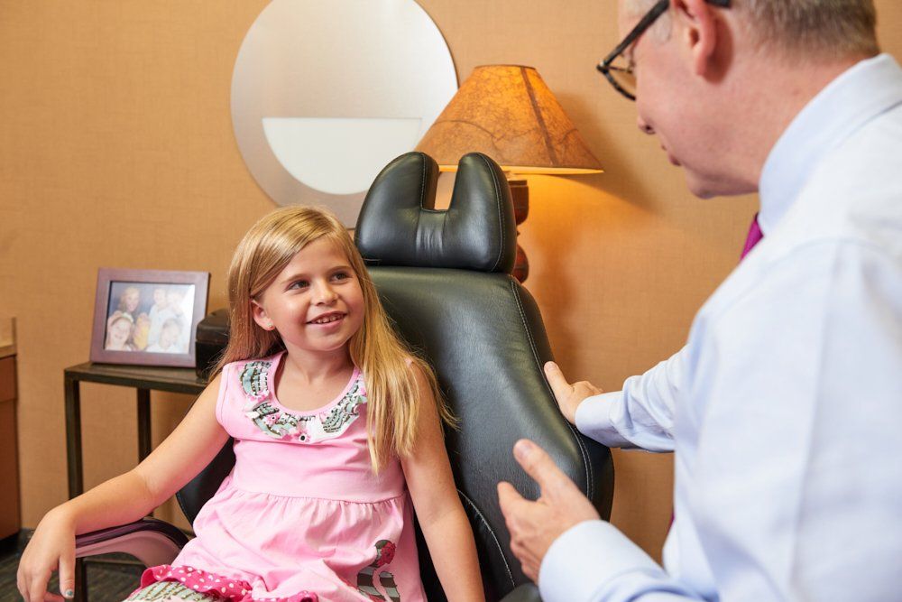 Photo of Dr. Boggan consulting a female patient