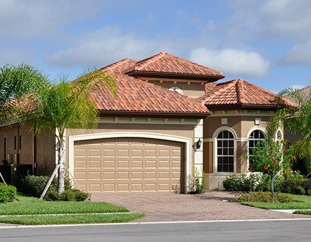 Tile Roofing Expert — Family House with Tile Roofing in Miami, FL Tile Roofing Expert — Family House with Tile Roofing in Miami, FL