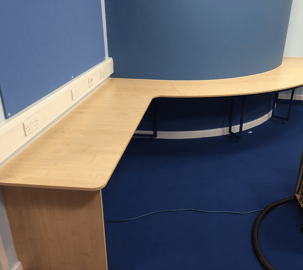 table fixed to wall