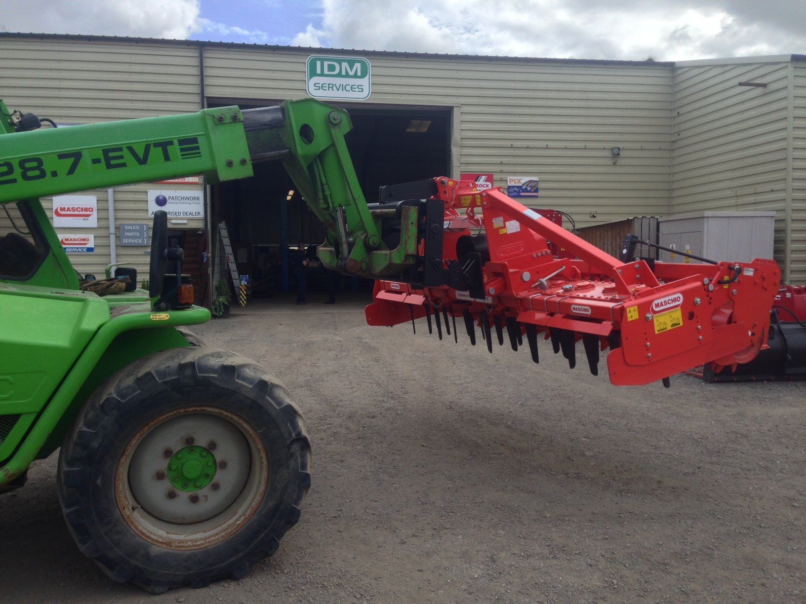 Three point linkage headstock in use on MERLO TELEHANDLER