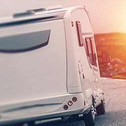 White RV Moving Forward - Recreational Vehicles in Daphne, AL White RV Moving Forward - Recreational Vehicles in Daphne, AL