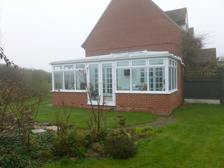 conservatory ahead of the lawn