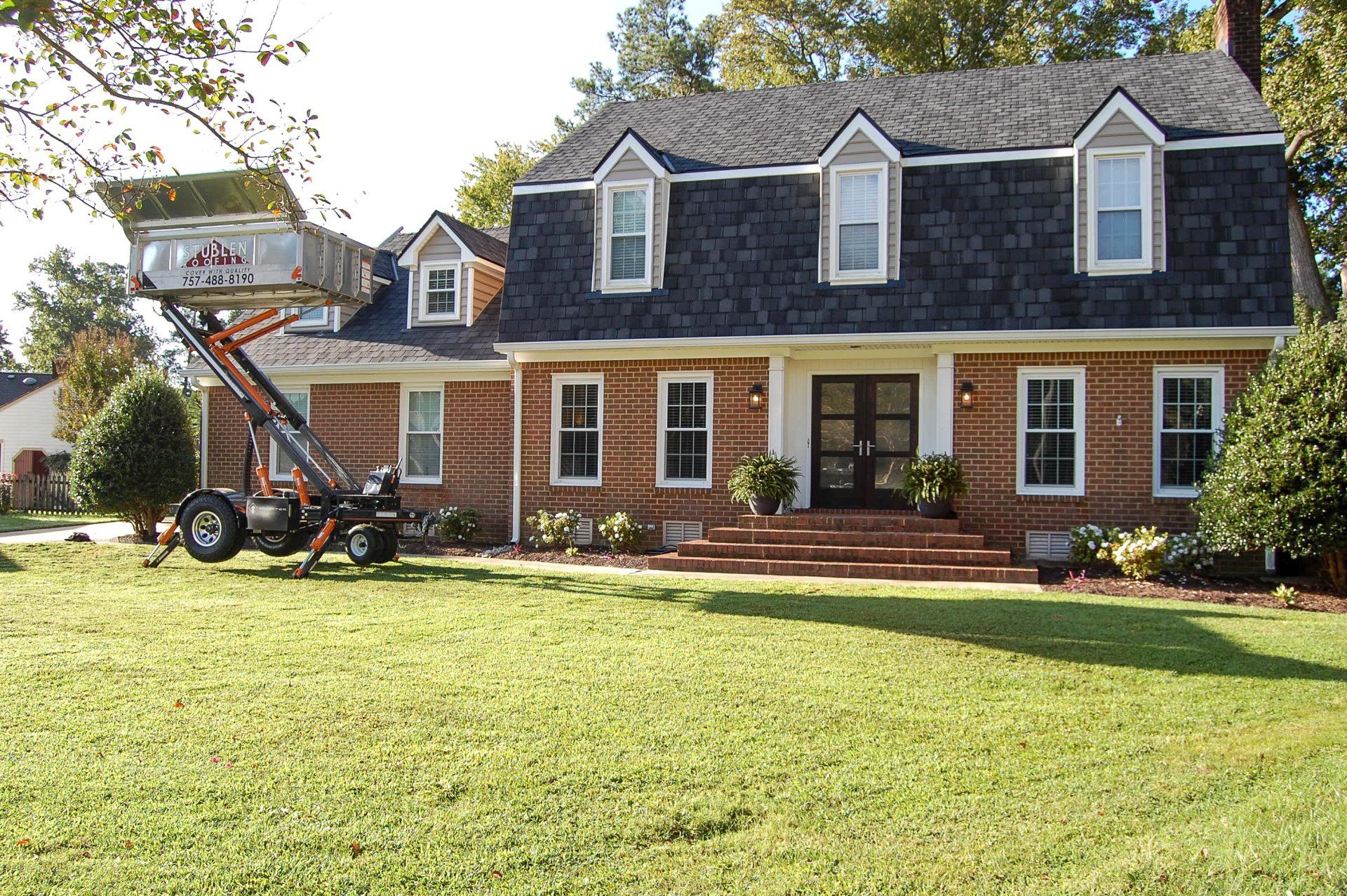 Equipter — House With Black Asphalt Shingle Roof in Portsmouth, VA Equipter — House With Black Asphalt Shingle Roof in Portsmouth, VA