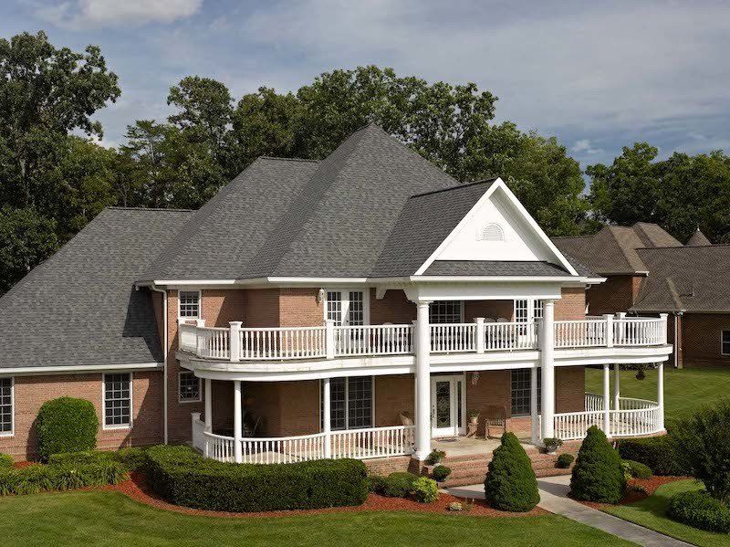 Architectural Asphalt Shingle Residential Roof in Colonial Slate with new White Trim wrap and gutters in Virginia Beach