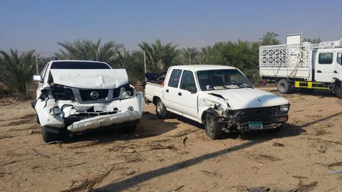 two broken cars