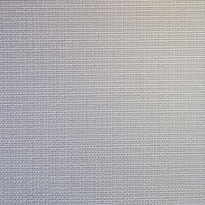 A close up of a white fabric with a grid pattern.