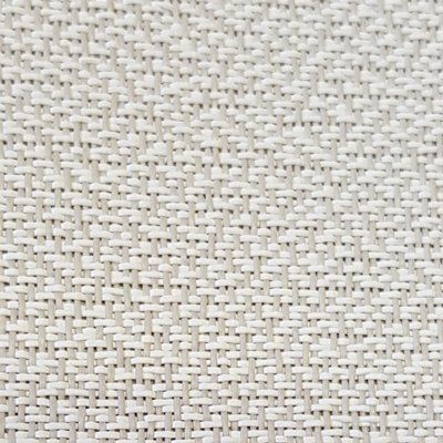 A close up of a white fabric with a woven pattern.