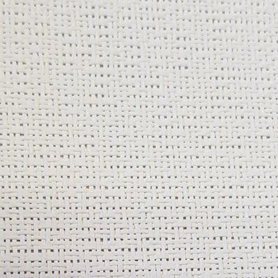 A close up of a white fabric with a grid pattern.